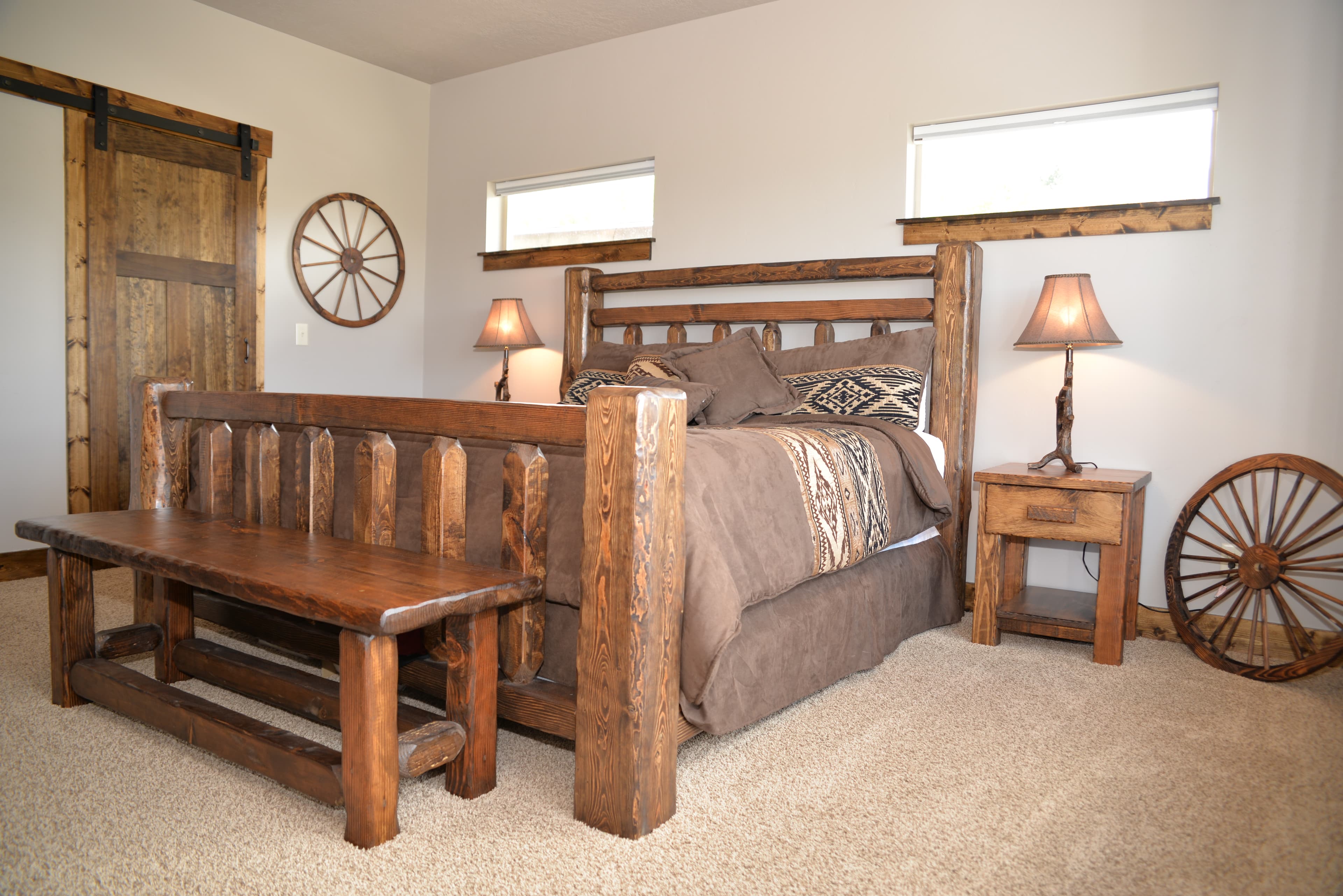 Master bedroom with wagon wheel bed